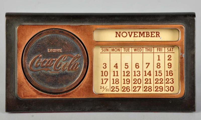 Metal Desk Calendar. 
1940s to
