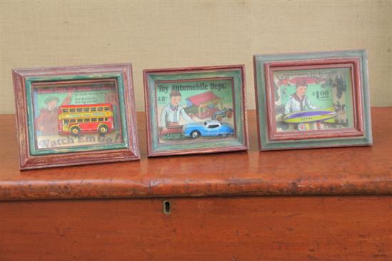 THREE PIECES. Framed toy advertisements