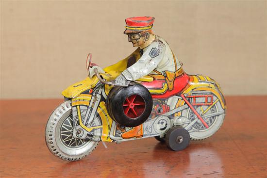 TIN WIND UP TOY. A lithographed