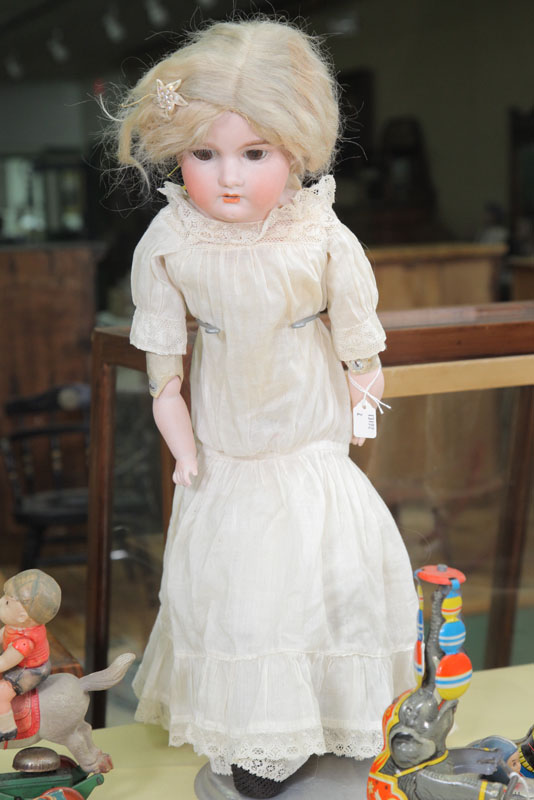BISQUE HEAD DOLL. A&M doll with