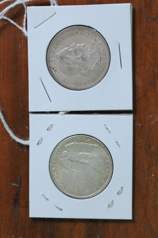 TWO COMMEMORATIVE SILVER HALF DOLLARS.