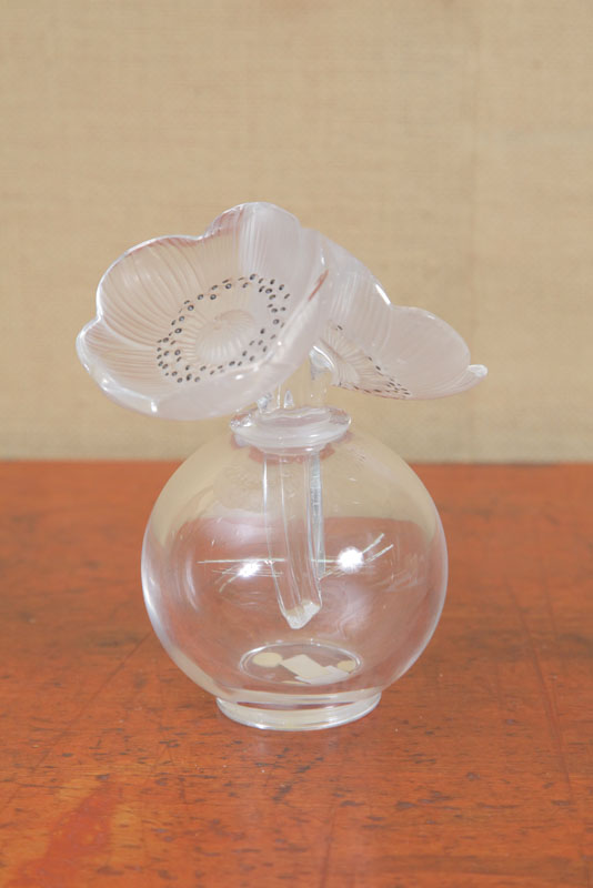 LALIQUE PERFUME. Clear bulbous body