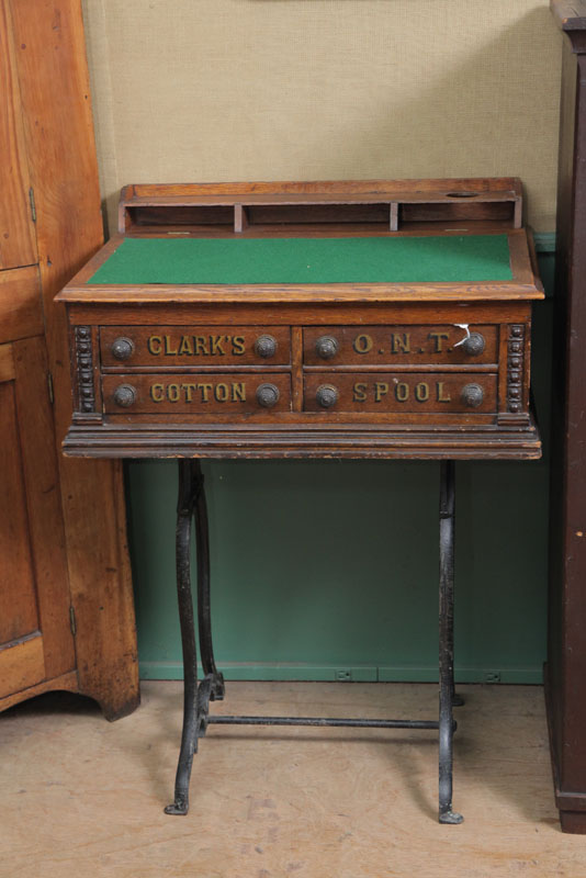 CLARK SPOOL CABINET ON STAND. Oak having