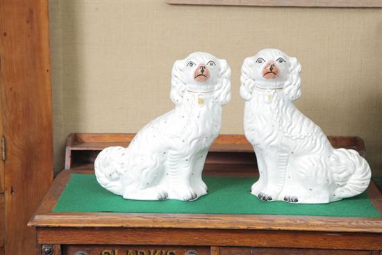 PAIR OF STAFFORDSHIRE SPANIELS.