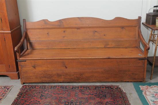 BENCH. Pine with a scalloped and paneled