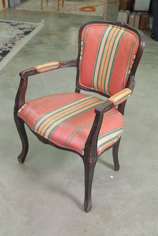 FOUR ARMCHAIRS. Carved crests with faux