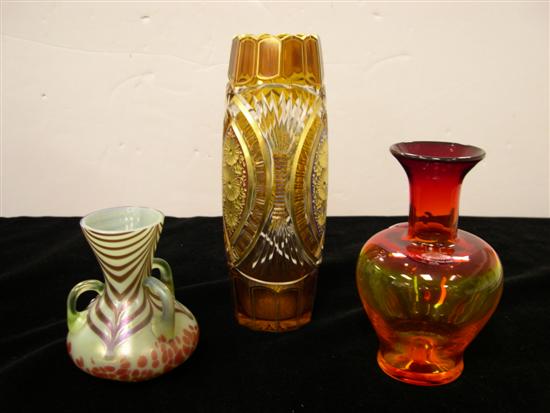 Glass including: Blenko  red to amber