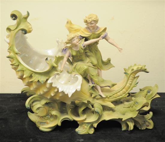 Porcelain figural centerpiece  boy and