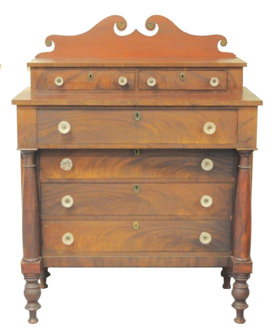 Mahogany four drawer chest with projecting