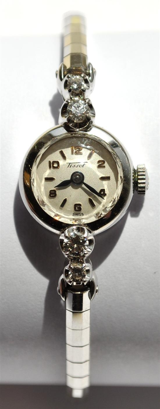 JEWELRY: 14K white gold ladys wristwatch