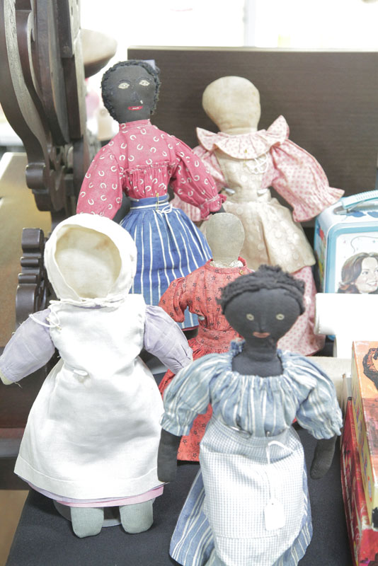 FIVE FOLKSY CLOTH DOLLS. Two black African