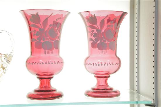 TWO CRANBERRY GLASS VASES. Having