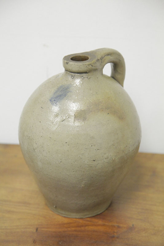 STONEWARE JUG. Ovoid form having an