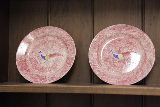 TWO SPATTERWARE PLATES. Similar  red