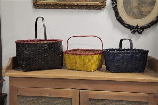 THREE PAINTED BASKETS. Finely woven