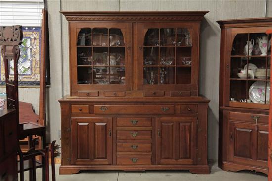 TWO PIECE CHINA CUPBOARD. Monitor