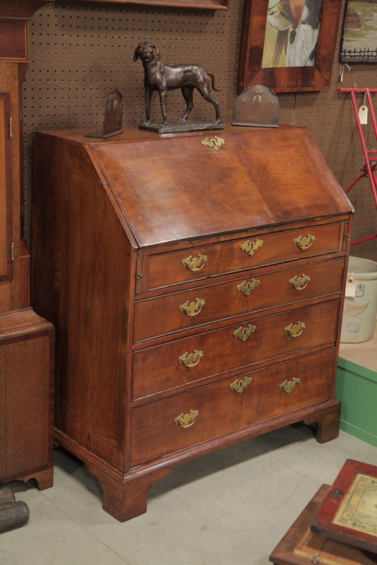 SLANT LID DESK. Walnut and of typical