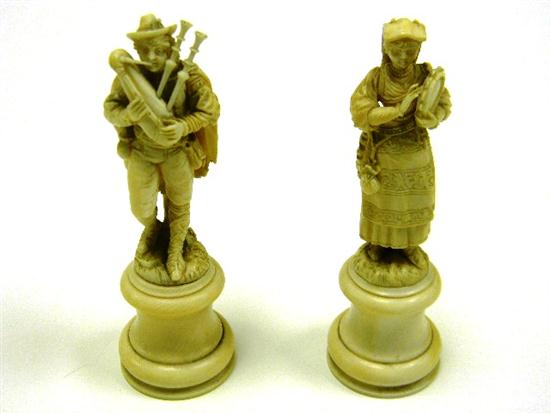 Ivory pair carved figures  probably