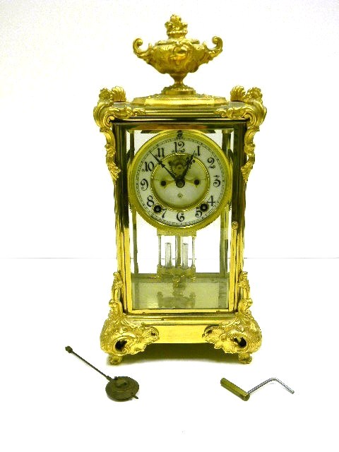 Brass mantel clock manufactured by Ansonia