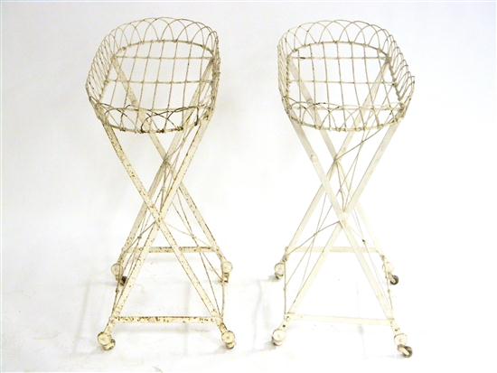 Two metal wire oval plant stands