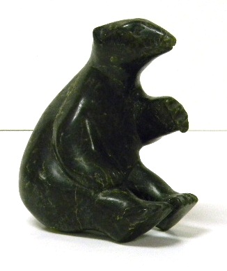 Inuit stone figure  seated bear  green