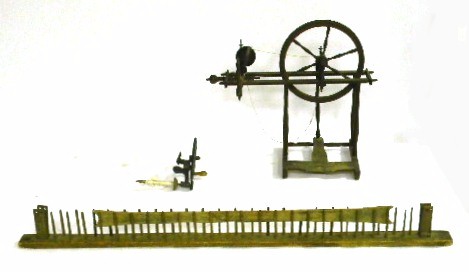 Three wooden tools including: warping