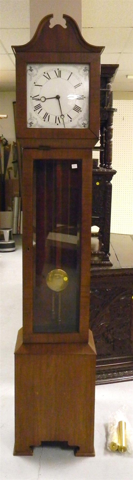 Tall case clock  20th C.  mahogany