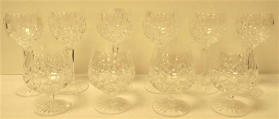 Six Waterford long stem wine glasses