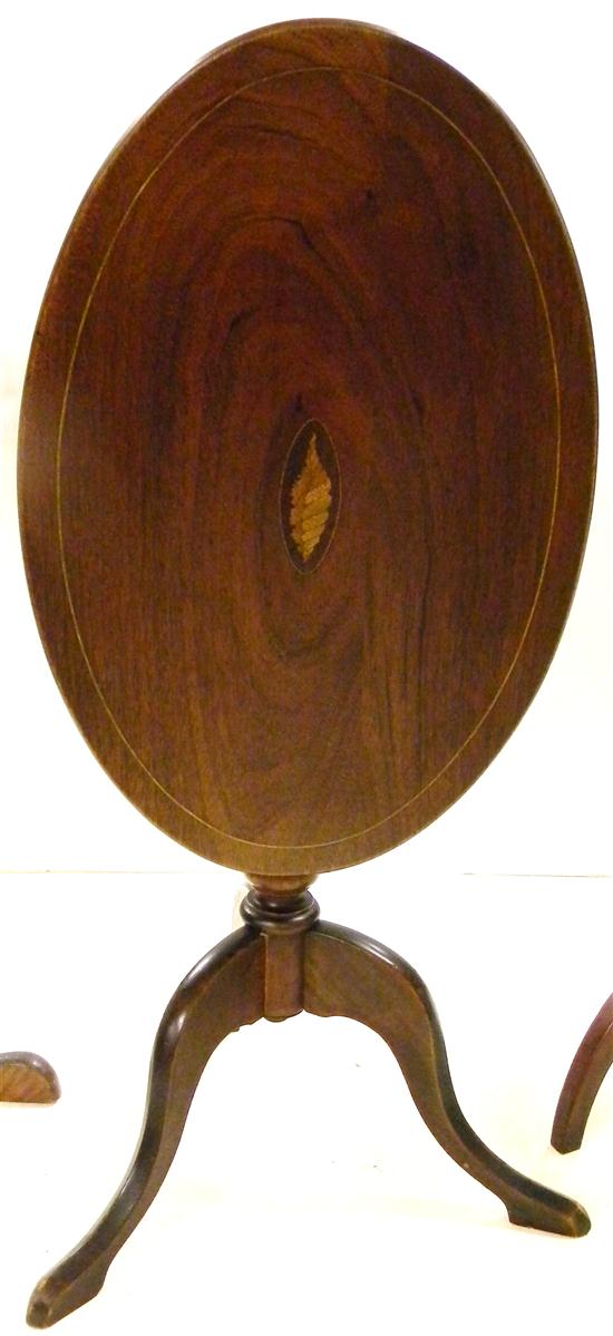 Small mahogany tilt top stand with