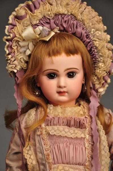 French Bisque Bébé Doll. 
Description