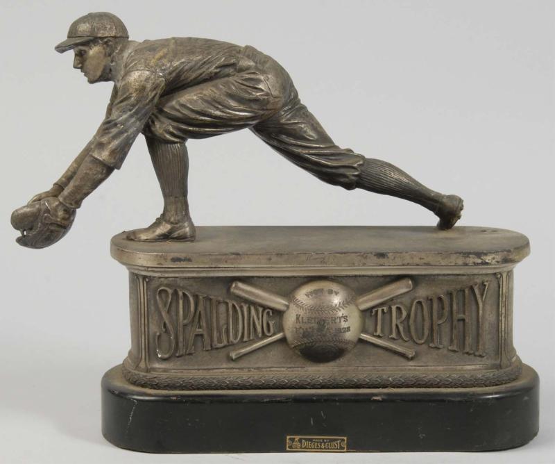 Metal Spalding Baseball Trophy. 
Description