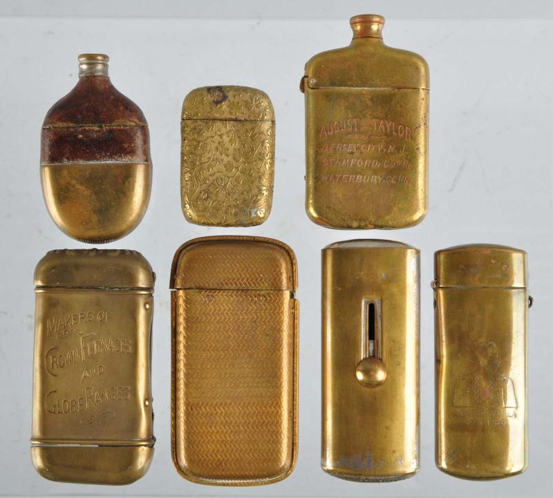 Lot of 7: Brass Match Safes. 
Description