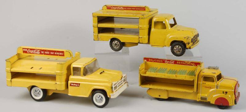 Lot of 3: Assorted Coca-Cola Toy Trucks.