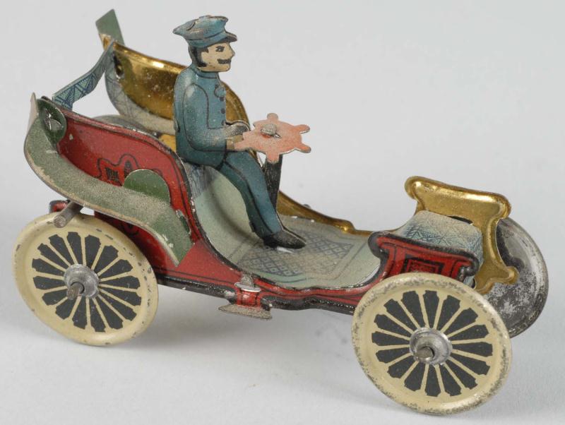 Tin Litho Automobile Penny Toy. 
Description