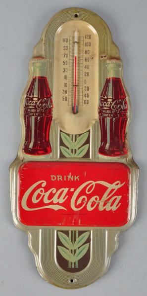 Tin Coca-Cola Thermometer. 
Description