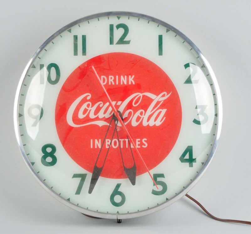 Early Light-Up Coca-Cola Clock. 
Description