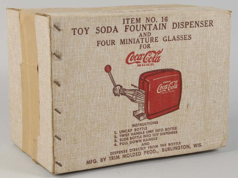 Coca-Cola Toy Dispenser. 
Description