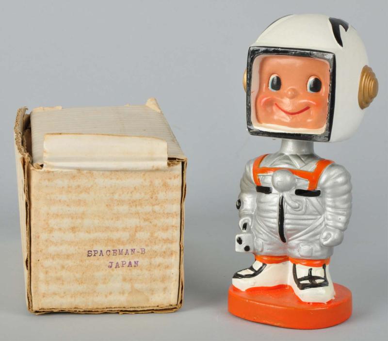 Spaceman Bobbing Head Doll. 
Description