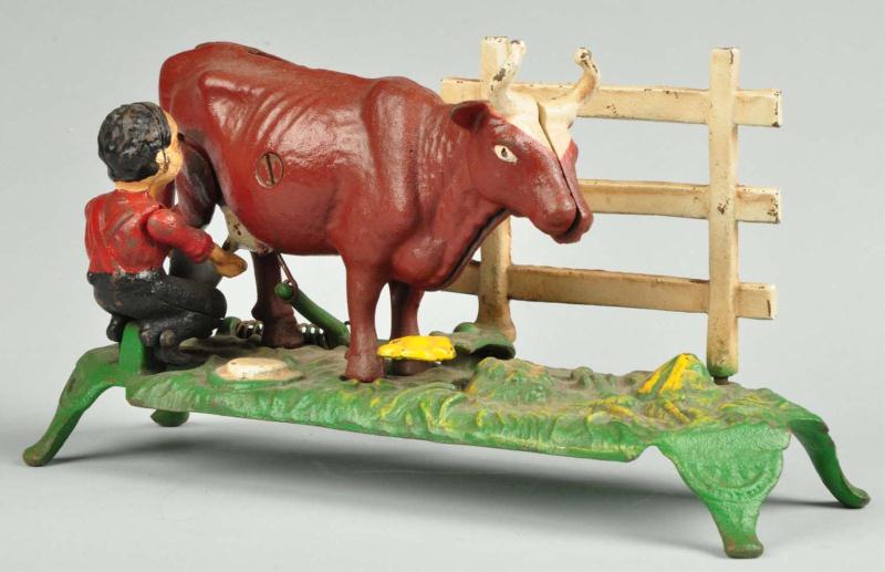 Cast Iron Milking Cow Mechanical Bank.