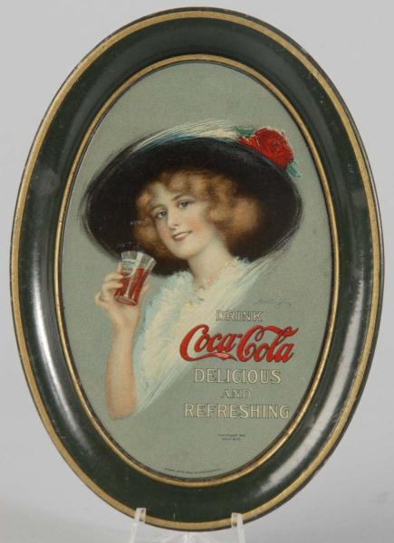 1913 Coca-Cola Change Tray. 
Description