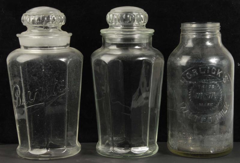 Lot of 3: Glass Store Jars. 
Description