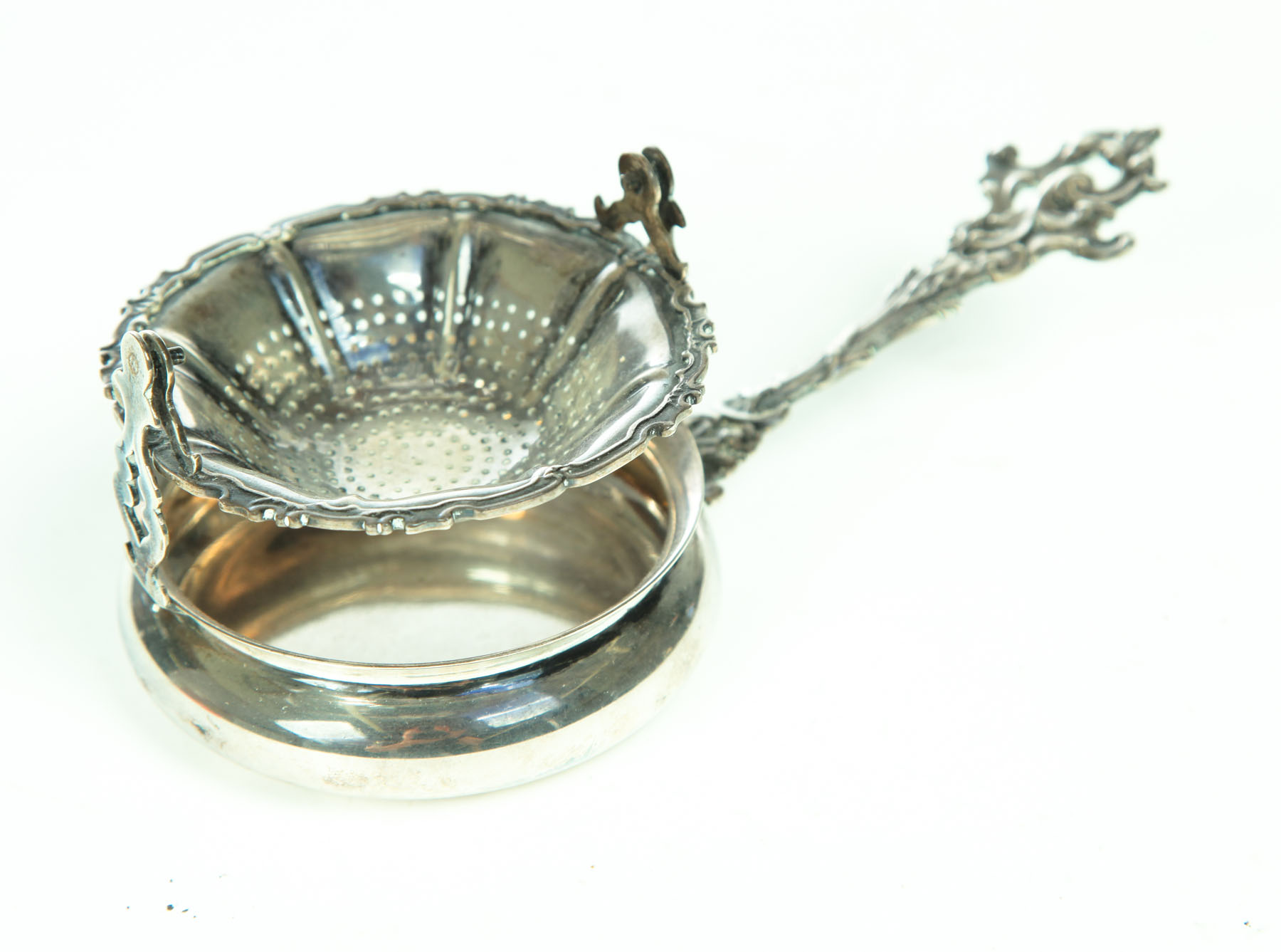 SILVER TEA STRAINER.  American  late