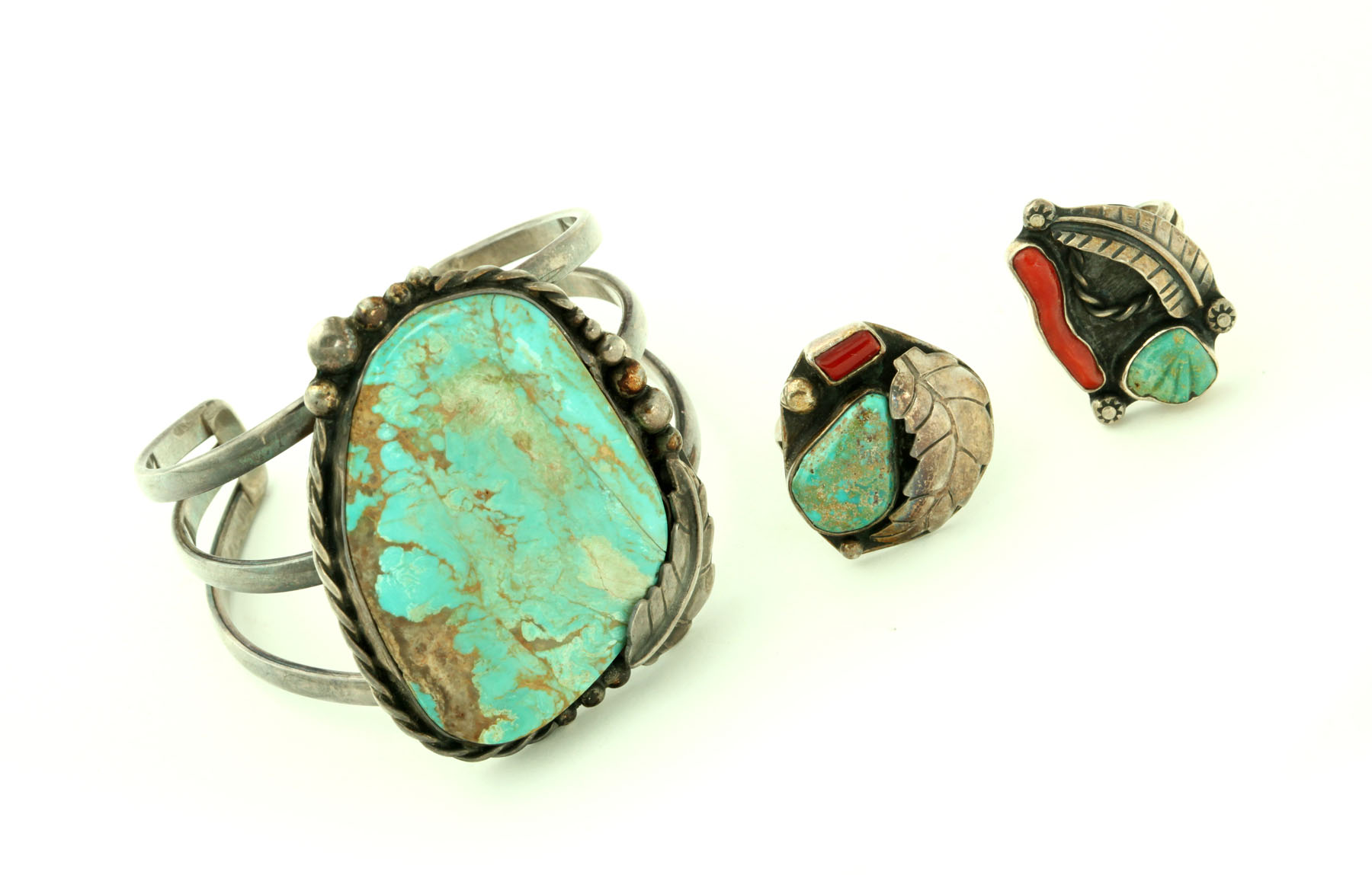 TURQUOISE SILVER CUFF AND TWO RINGS.