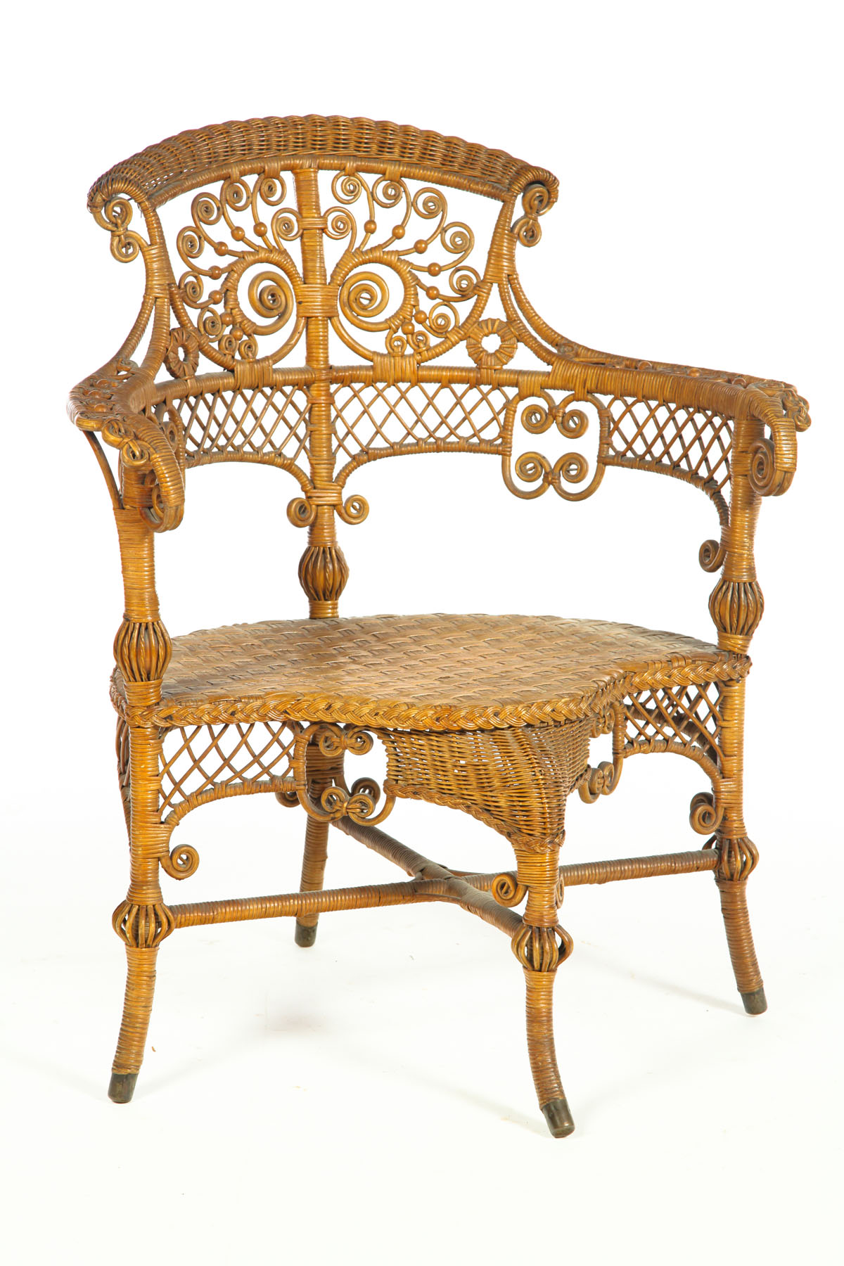 ORNATE WICKER ARMCHAIR.  American  late