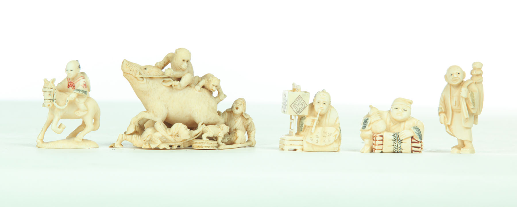 FIVE IVORY CARVINGS.  Japan  20th century.