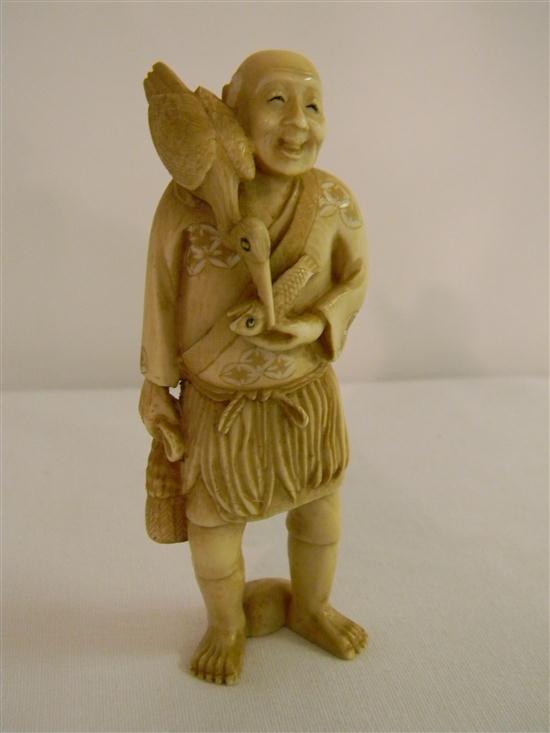 Japanese  20th C.  ivory figure of a