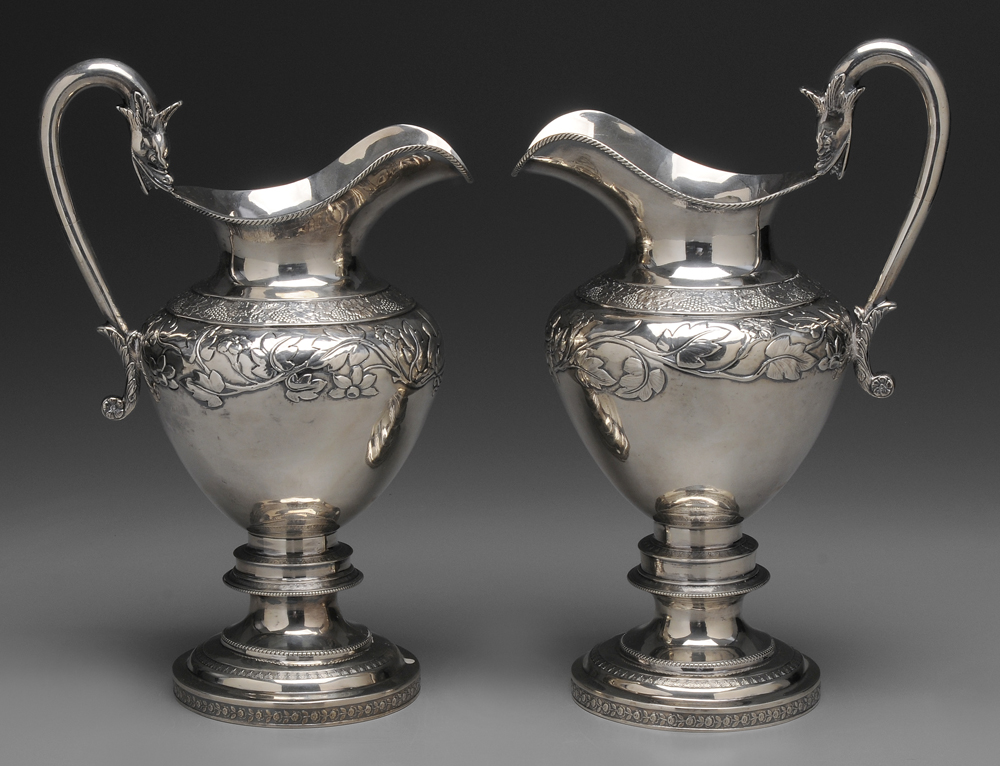 Pair Presentation Coin Silver Pitchers