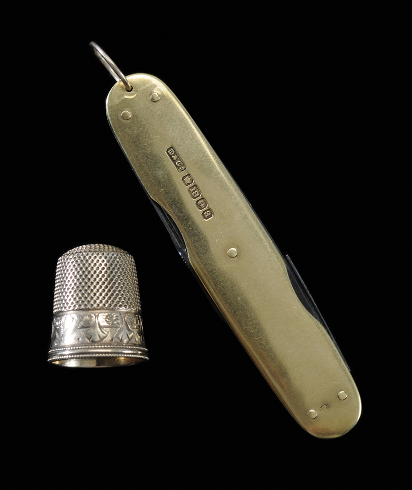 Gold Pocket Knife and Thimble English