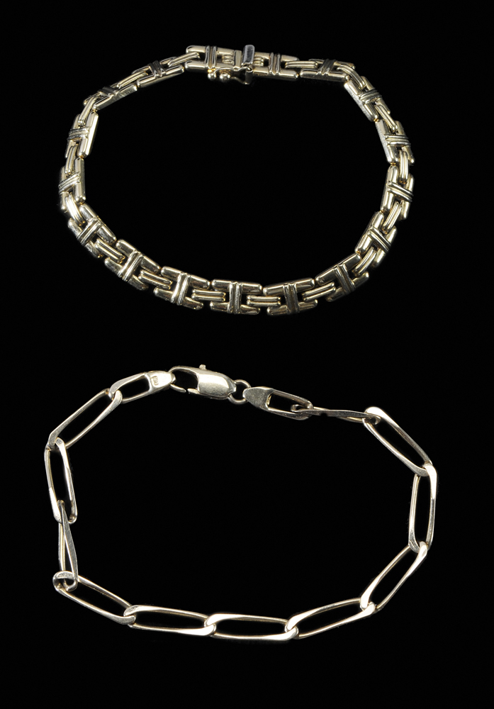 Two Gold Bracelets one 14 kt. single-link