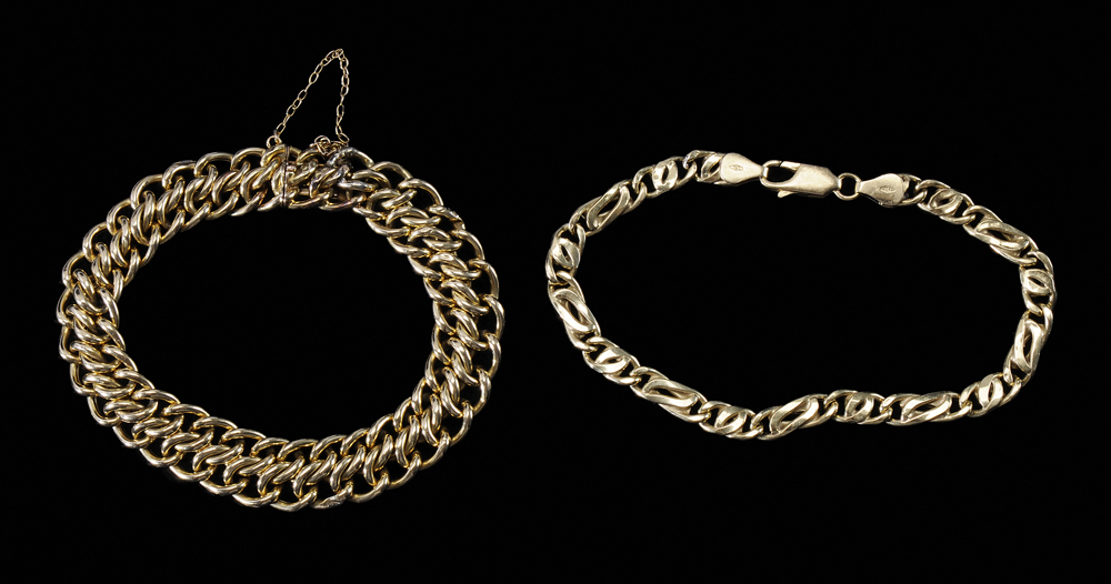 Two Gold Bracelets one with double
